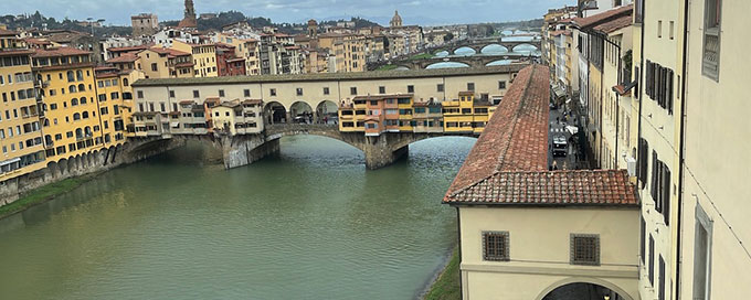 A bridge between buildings in Florence
